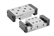 Dovetail slides with end plates and location holes
