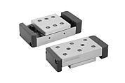 Precision slides roller mounted with end plates and location holes